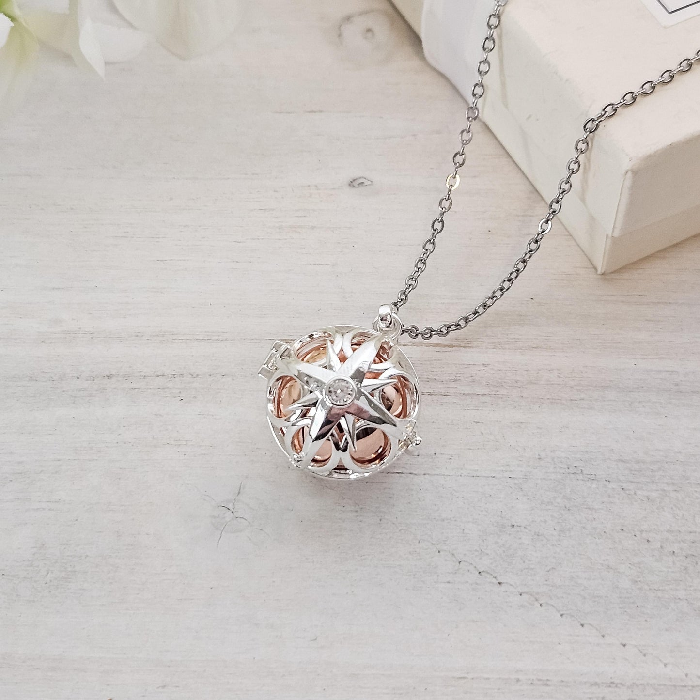 Elegant Memorial Starburst Urn Ball Necklace – Keepsake for Ashes
