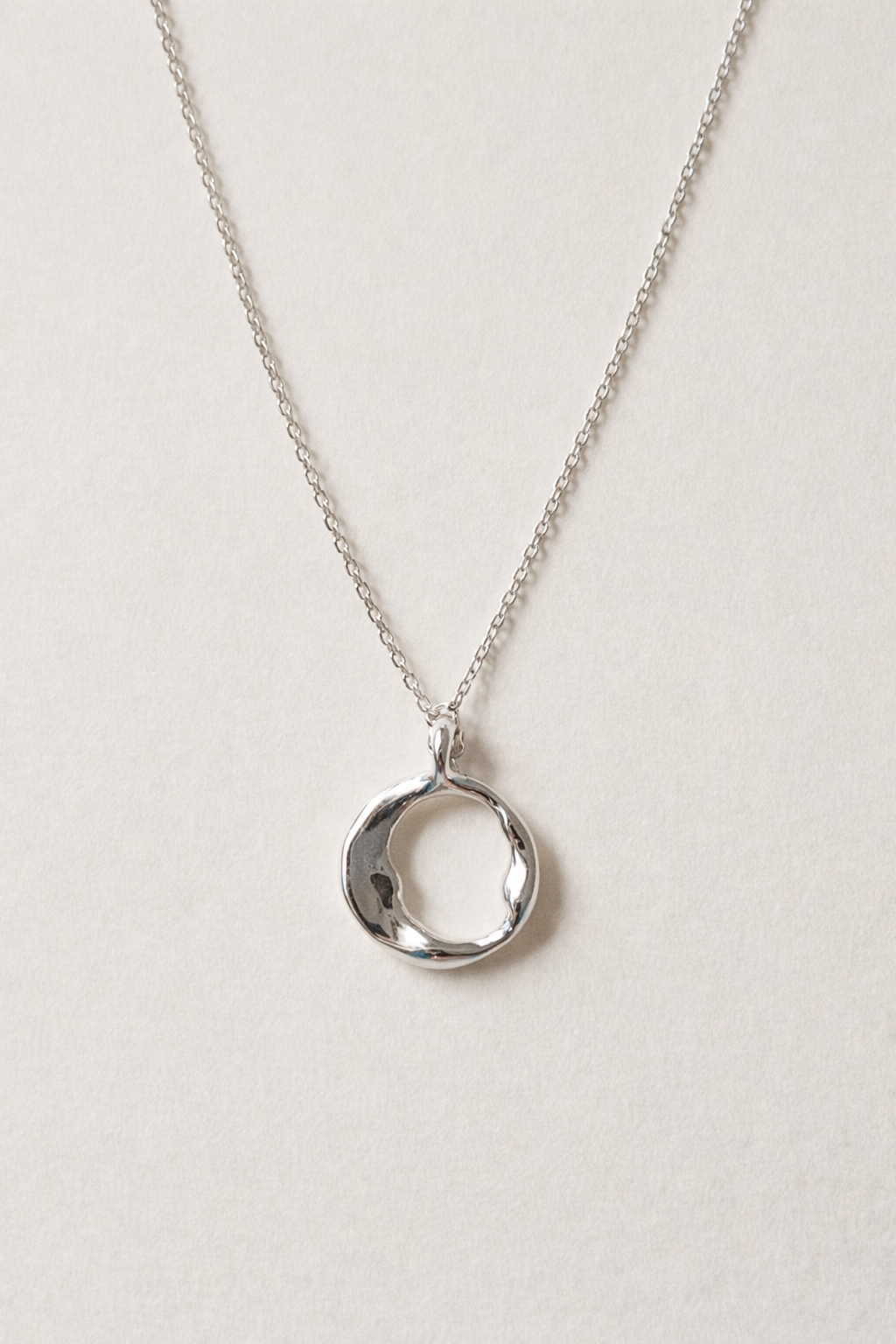 Molten Circle Crescent Silver Necklace