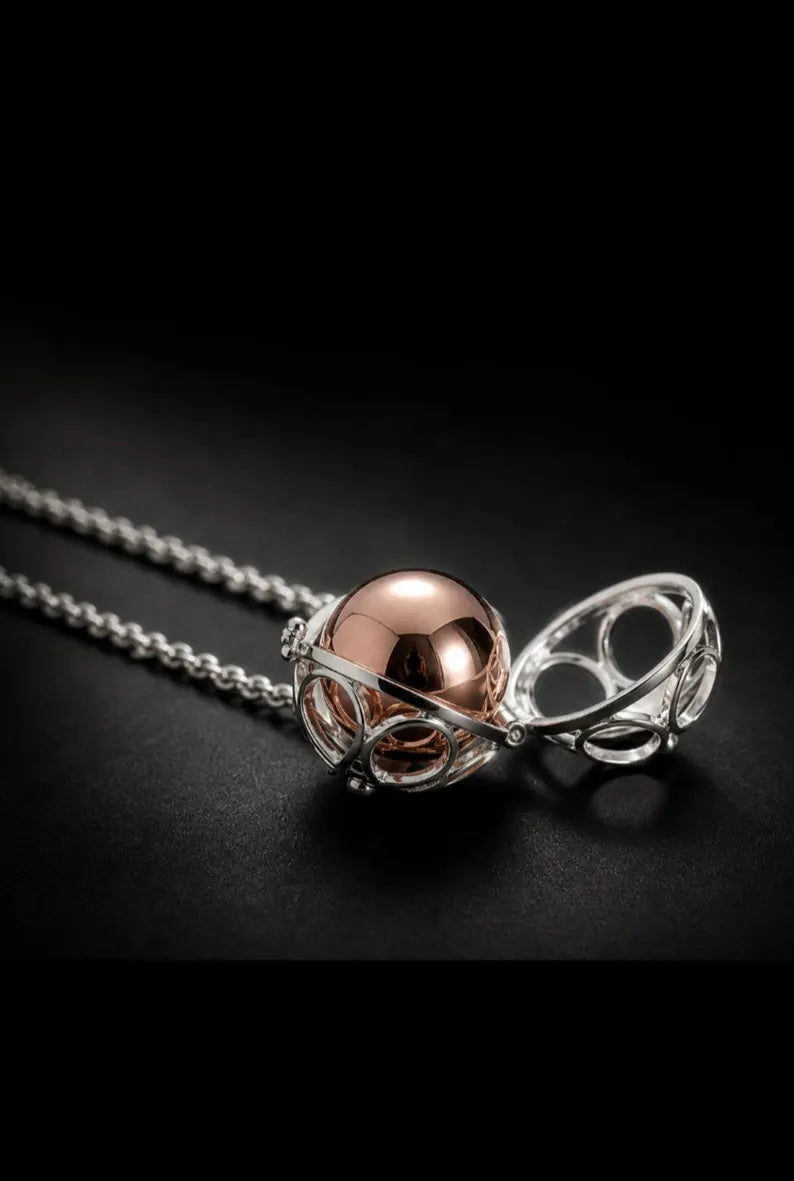 Elegant Memorial Starburst Urn Ball Necklace – Keepsake for Ashes