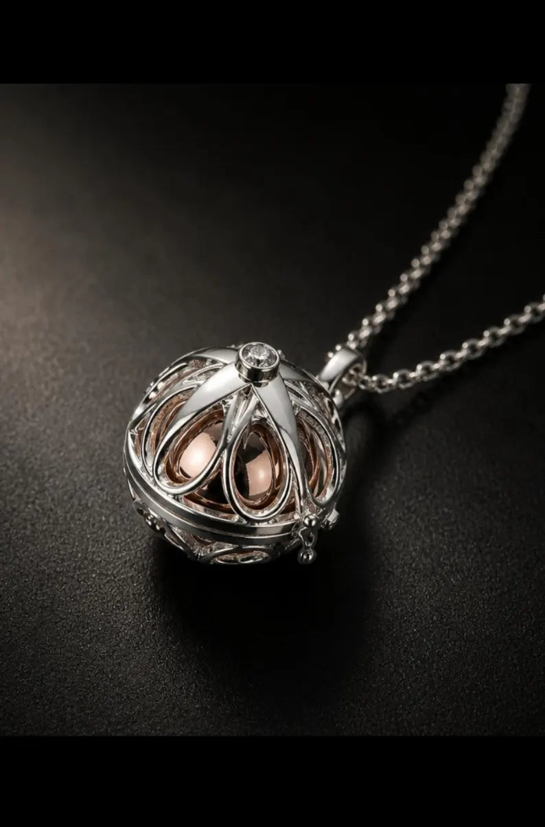 Elegant Memorial Starburst Urn Ball Necklace – Keepsake for Ashes