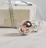 Load image into Gallery viewer, Elegant Memorial Starburst Urn Ball Necklace – Keepsake for Ashes, Cremation Necklace, Grief Gift
