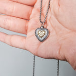 Load image into Gallery viewer, Engraved Silver Heart Paw Print Pet Memorial Urn Necklace – Keepsake for Cremation Ashes
