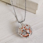Load image into Gallery viewer, Meet Me in the Blossom - Floral Cage Urn Ball Necklace, Keepsake for Ashes, Cremation Necklace, Grief Gift
